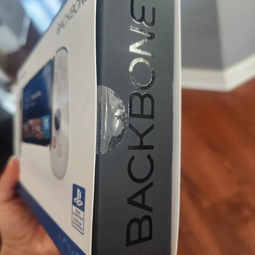 New In Box. Sony PlayStation White Backbone Handheld Console
